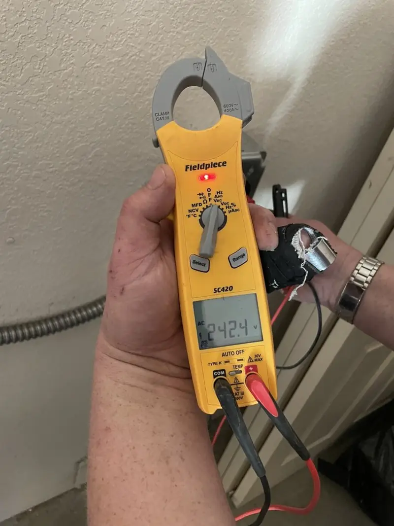 Voltage testing with clamp meter during Aluminum Wiring Replacement in Oakfield